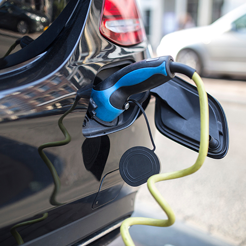 close-up-to-car-back-ev-charger-station-discovery-bay-ca