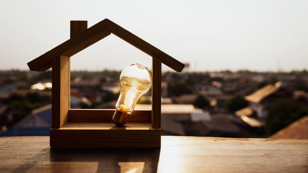 yellow-bulb-lighting-between-tiny-wood-home-discovery-bay-ca
